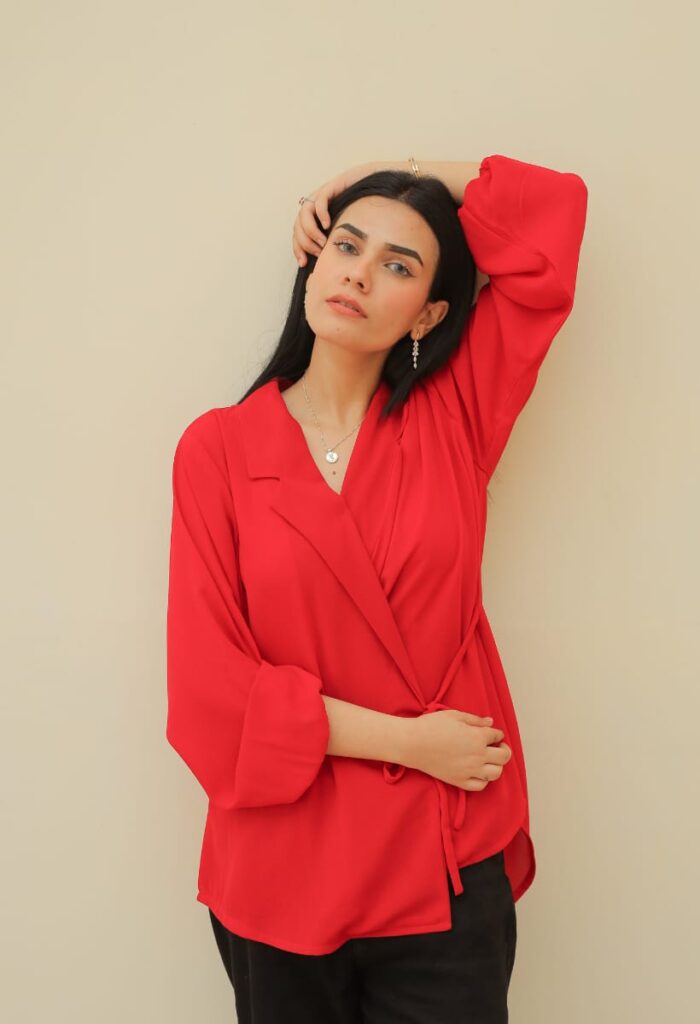 women model wearing red shirt black pant studio outdoor
