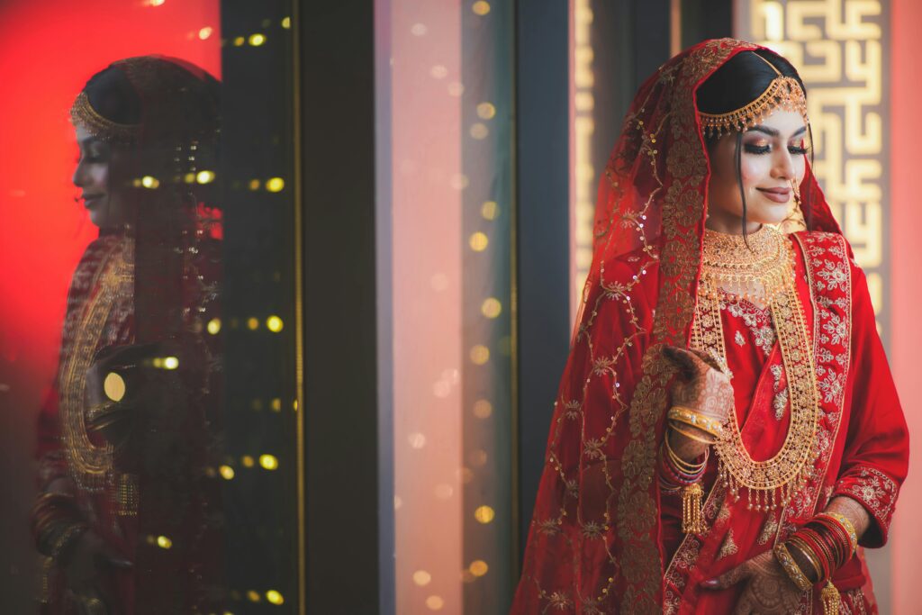 Bride in traditional red attire.